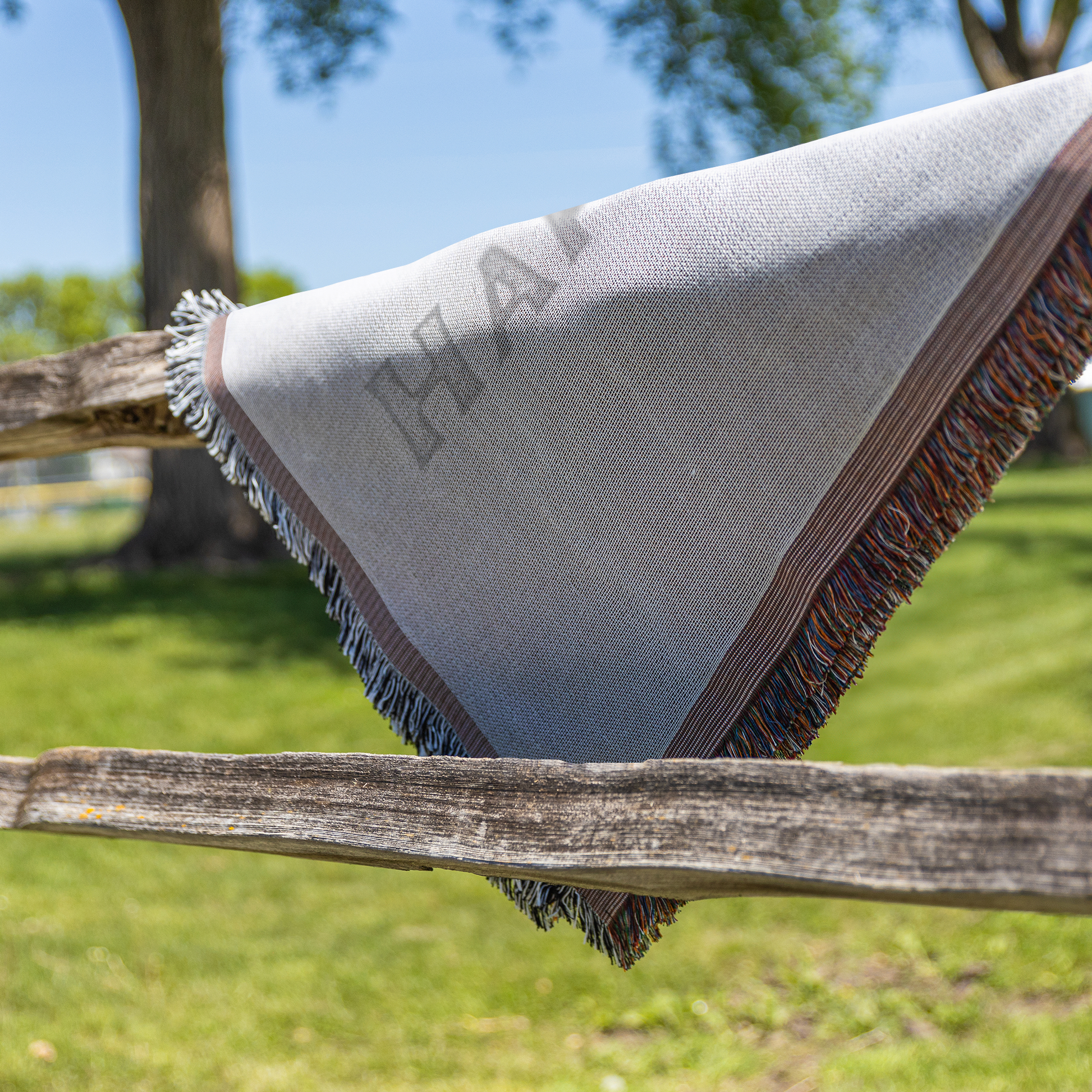 Personalized_Happy_Camper_-_Woven_Blanke_Fence_V_Mockup.png